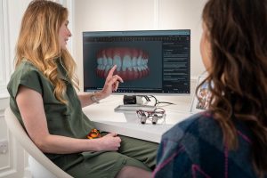 Dental consultation for full-arch implant candidates at Red Bud Dental in Round Rock